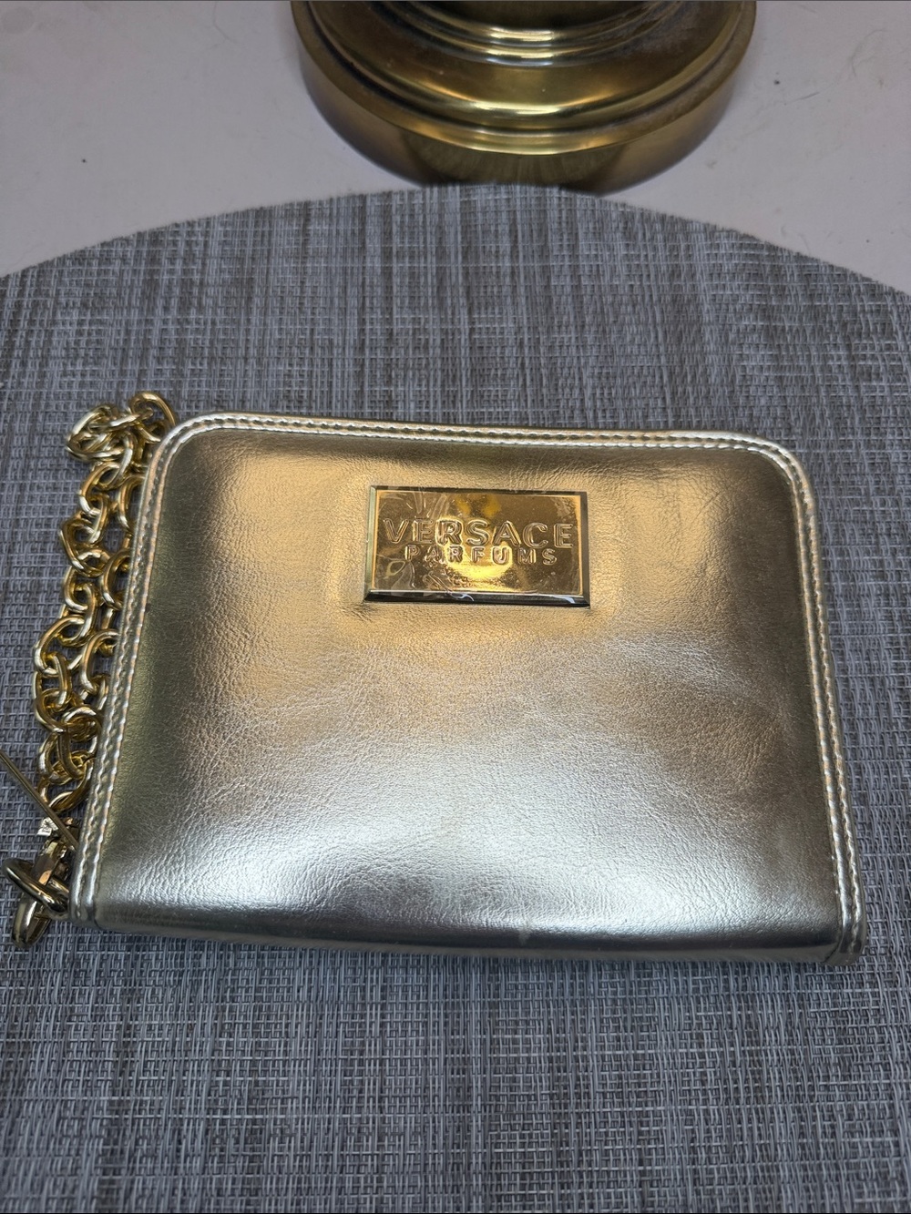 Versace Parfums Gold Metallic Wristlet with Chain